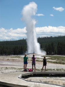 Students observe one of the many geysers in Yellowstone.