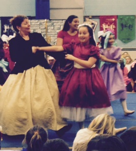 Clara's sister Molly (Maddie Baecker) dancing with a Party-Goer (Mrs. Lemay)
